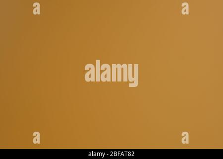 Light brown background. Dark yellow abstract background. Simple background with soft gradient. Stock Photo