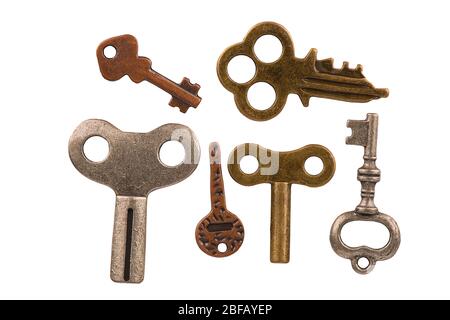 Closeup on a set of old keys, isolated on white background. Cut out. Stock Photo