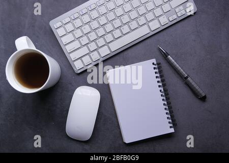 high angle view of notepad keyboard and mouse on table  Stock Photo