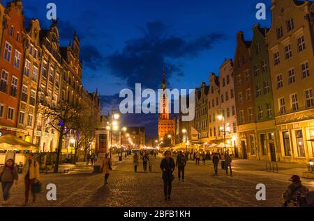 Gdansk, Poland, April 15, 2018: People walk along Dluga Long Market pedestrian street Dlugi targ square in old historical town centre, City Hall and t Stock Photo