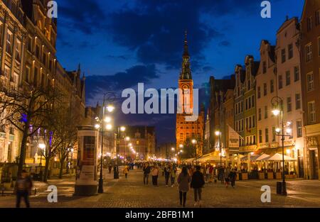 Gdansk, Poland, April 15, 2018: People walk along Dluga Long Market pedestrian street Dlugi targ square in old historical town centre, City Hall and t Stock Photo