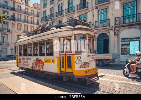 Lisbon, Portugal - June 15, 2017: Famous yellow tram 28 in Lisboa on Largo Lu s de Camoes square Stock Photo