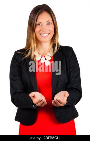 Smiling woman with open hands and palms facing up. Business woman holds out open hands, smiling. Support and assistance concept. Stock Photo