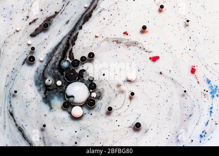 Bright colorful acrylic paint. Macro structure of Multicolored Bubbles Paint and Oil. Stock Photo