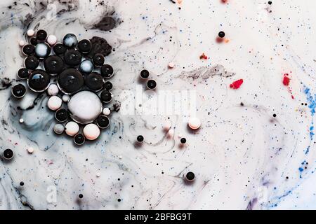 Colored abstract background.Ink Bubbles In Water. Abstract colorful paint. Stock Photo