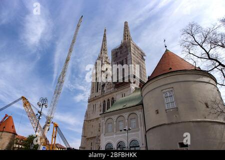 Crane being lifted to remove north cathedral tower, while south tower fell to the ground after strong earthquake in Zagreb Stock Photo