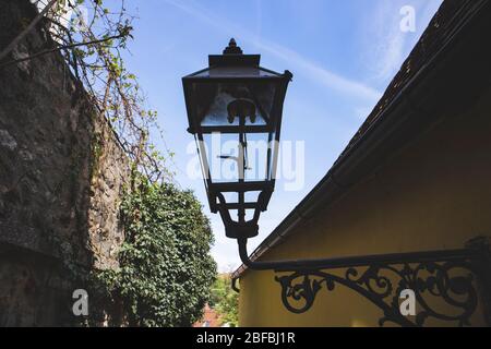 Old street lantern, lit by gas in old, historical Zagreb city center Stock Photo