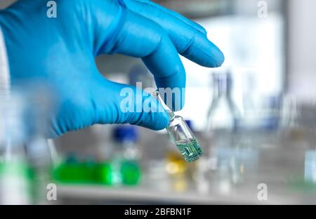 Pharmaceutical research. Scientist developing a new drug or vaccine in the lab. Stock Photo
