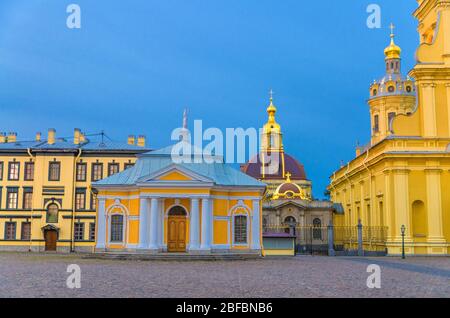 Boot house near Saints Peter and Paul Cathedral Orthodox church in Peter and Paul Fortress citadel on Zayachy Hare Island, evening dusk twilight view, Stock Photo