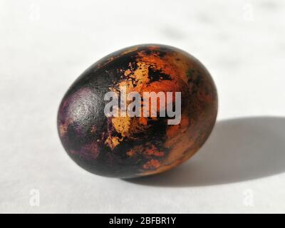 Traditionally lithuanian painted Easter egg isolated on the white background Stock Photo
