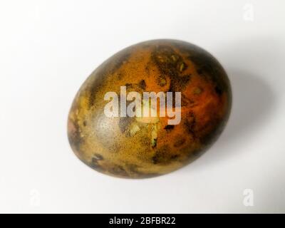Traditionally lithuanian painted Easter egg isolated on the white background Stock Photo