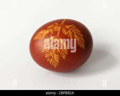 Traditionally lithuanian painted Easter egg isolated on the white background Stock Photo
