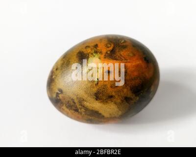 Traditionally lithuanian painted Easter egg isolated on the white background Stock Photo