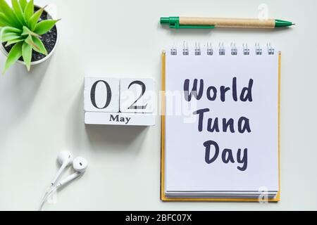 Holiday world tuna day - 02 second May Month Calendar Concept on Wooden Blocks. Close up. Stock Photo