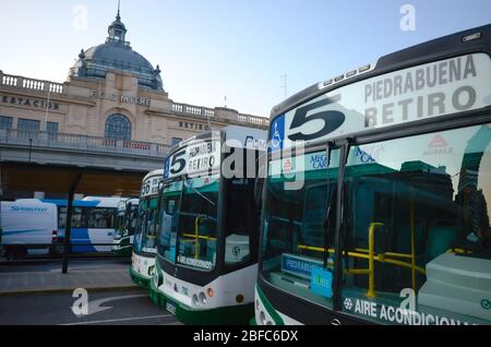 Buenos Aires, Argentina - January, 2020: Buses of route 5 on a bus stop in front of Retiro Mitre railway station (Estacion Retiro Mitre) near Plaza Sa Stock Photo