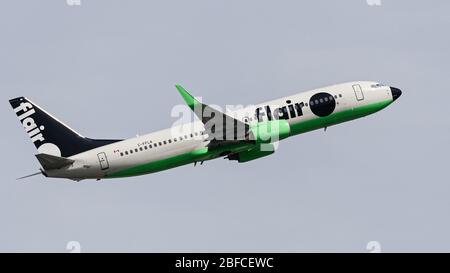 Richmond, British Columbia, Canada. 17th Apr, 2020. A Flair Airlines Boeing 737-800 narrow-body jet (C-FFLA) airborne after take-off from Vancouver International Airport on a flight to Calgary, Alberta, Friday, April 17, 2020. Credit: Bayne Stanley/ZUMA Wire/Alamy Live News Stock Photo