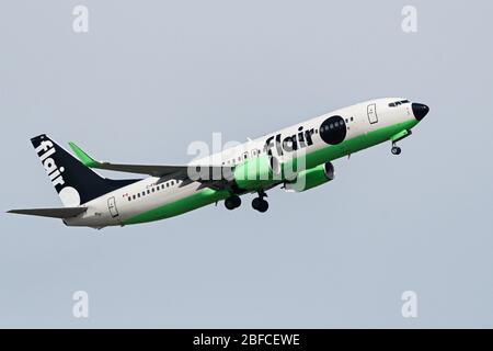 Richmond, British Columbia, Canada. 17th Apr, 2020. A Flair Airlines Boeing 737-800 narrow-body jet (C-FFLA) airborne after take-off from Vancouver International Airport on a flight to Calgary, Alberta, Friday, April 17, 2020. Credit: Bayne Stanley/ZUMA Wire/Alamy Live News Stock Photo