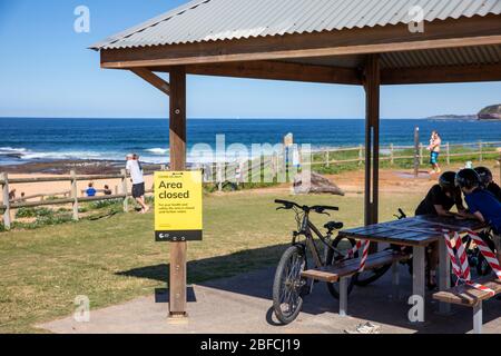 Sydney, Australia. Saturday 18th  April 2020. Mona Vale beach on Sydney's northern beaches is one of the city's beaches that remains open but residents are only able to access the beach for the purpose of taking exercise. Picnic and barbeque areas at the beach are closed due to COVID-19 pandemic..Credit Martin Berry/Alamy Live News Stock Photo