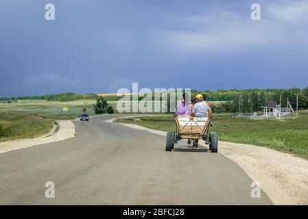 Horse wagon on a road in Glodeni District of Moldova Stock Photo