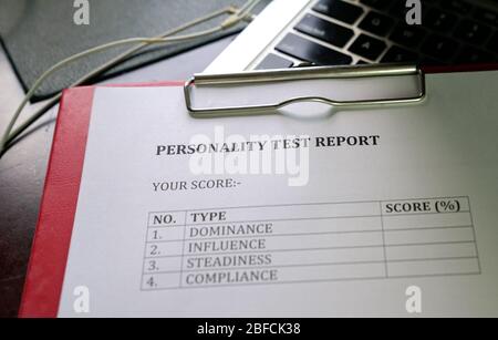 Personality test report. On clipboard. Human Resource, career or Job Interview concept. Stock Photo