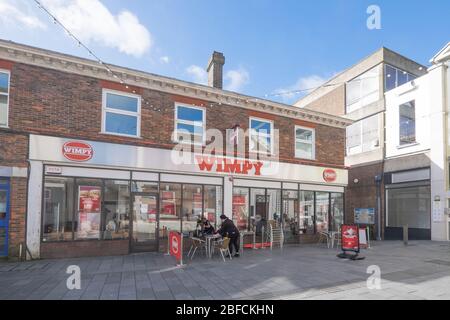 Ashford, Kent, United Kingdom - March 9, 2020: Wimpy burger and fast food restaurant on Tufton Street in Ashford town centre, UK Stock Photo