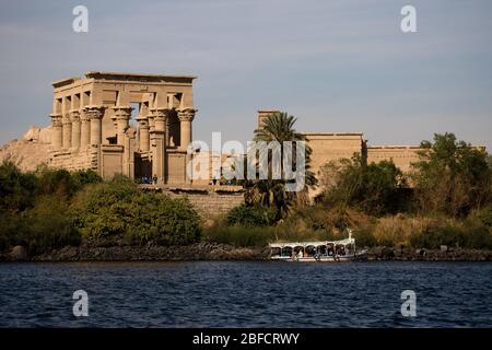 River-level view of the Philae Temple and Trajan's Kiosk on the Nile River near Aswan, Egypt. Stock Photo