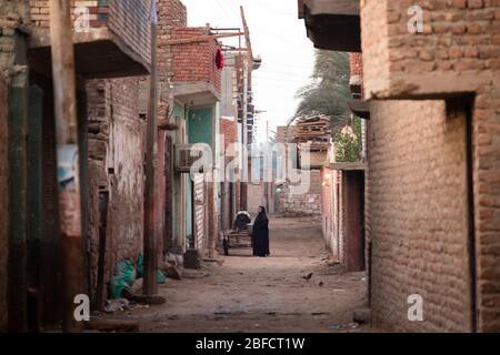 Village backstreet at the Daraw Animal Market near Aswan, Egypt. Stock Photo