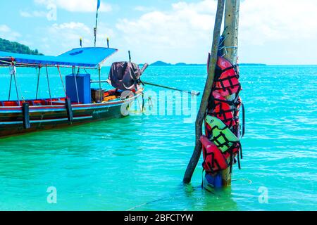 Life jackets are attached to pillars at sea. Buoys for which it is not recommended to swim Stock Photo