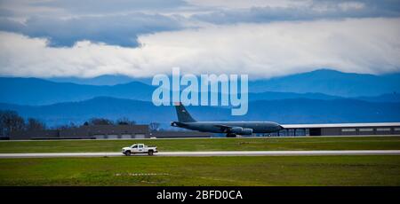 A KC-135 Stratotanker from the 134th Air Refueling Wing taxies onto the runway in front of low cloud cover over the Smoky Mountains at McGhee Tyson Air National Guard Base, March 12 2020. Stock Photo