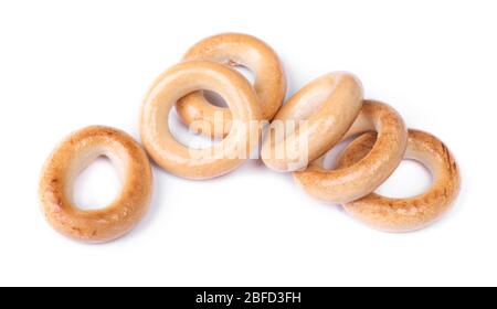 Heap of small dry bagels, bread rings isolated on white background Stock Photo