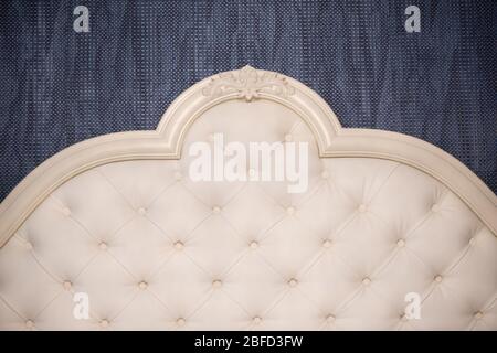 Headboard of a bed in classical style in a bedroom Stock Photo