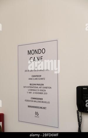 A sign for the art work titled 'Mondo cane', by Jos de Gruyter and Harald Thys, in the Belgian pavilion at the Venice Biennale 2019 Stock Photo