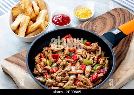 Chopped steak or Bistec Picao and patacones or tostones are fried green plantain slices, made with green plantains, Tipical Panamá food, Panamá, Centr Stock Photo