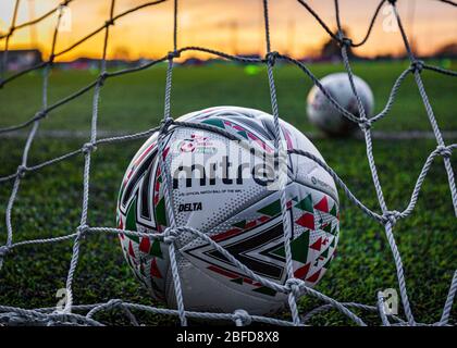 Welsh Premier League footballs on the 4G pitch at Cyncoed Campus before a match between Cardiff Met Uni FC and Caernarfon Town in the JD Cymru Premier Stock Photo