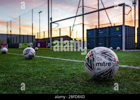 Welsh Premier League footballs on the 4G pitch at Cyncoed Campus before a match between Cardiff Met Uni FC and Caernarfon Town in the JD Cymru Premier Stock Photo