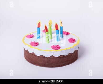 Artificial cake on a white isolated background. Stock Photo
