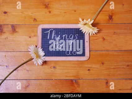Reminder "Things to do" written on a chalkboard with chalk Stock Photo