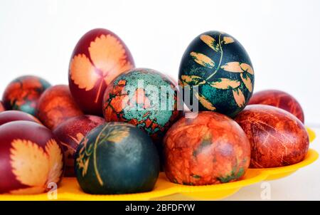 Easter orthodox eggs on Easter day lined up in a pile on white background Stock Photo