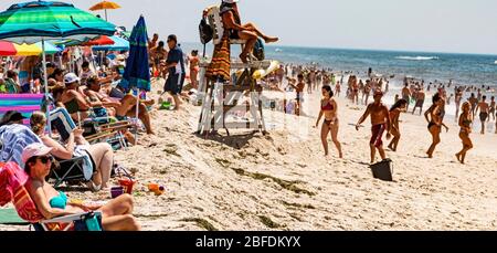 Babylon, New York, USA - 14 July 2019: Robert moses beach on Fire Island New York is very crowded with people enjoying a Juy afternoon. Stock Photo