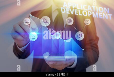 Writing note showing Application Development. Business concept for creation of Computer Apps for use on Mobile Devices Stock Photo