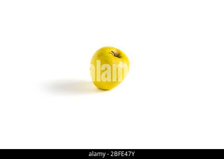 Isolated yellow apple on white background - horizontal image Stock Photo