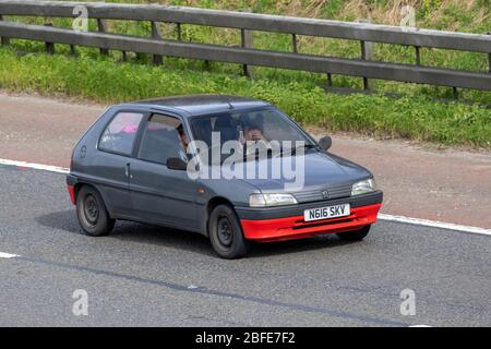 2001 Peugeot 106 Independence Orange Car Hatchback Petrol 1124 cc;  travelling on the M61 motorway UK Stock Photo - Alamy