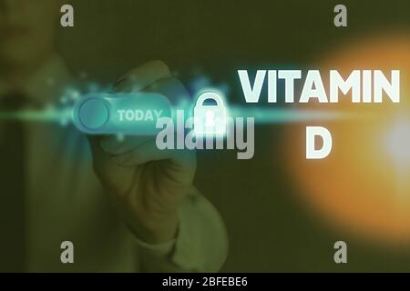 Handwriting text writing Vitamin D. Conceptual photo Nutrient responsible for increasing intestinal absorption Stock Photo