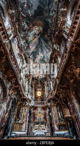 Feb 2, 2020 - Munich, Germany: Interior of Asamkirche baroque church with altar and ceiling view Stock Photo