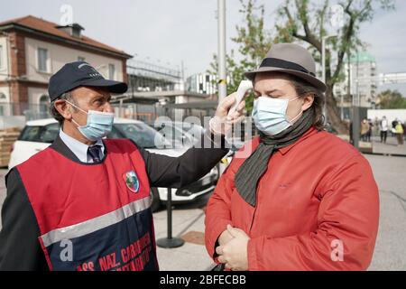 The body temperature check post on the entrance of hospital building. Turin, Italy - April 2020 Stock Photo