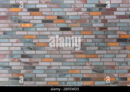 Dutch clinker dark bricks pattern in different tones of orange grey red Stock Photo
