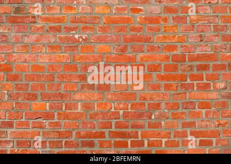 Texture of old red brick wall dutch clinker in different red tones Stock Photo