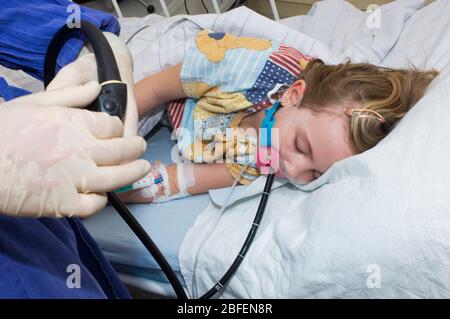 Young child undergoing endoscopic examination - Model Released Stock Photo