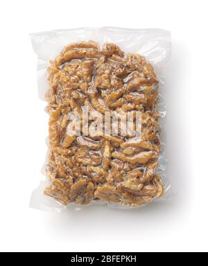 Vacuum plastic bag of peeled walnuts isolated on white Stock Photo