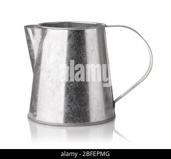 Side view of unpainted zinc plated tin jug isolated on white Stock Photo